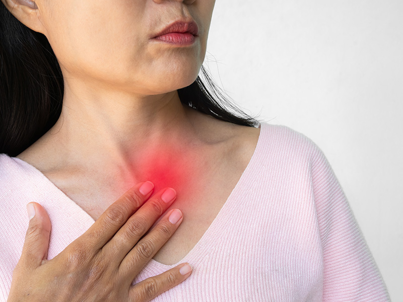 A woman suffering from silent acid reflux